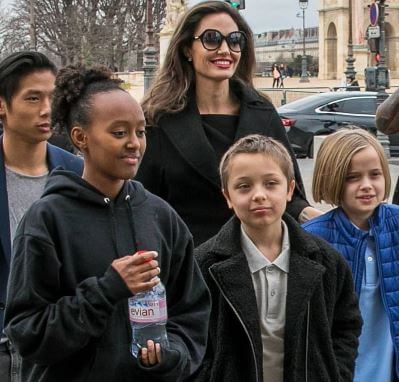 Knox Jolie-Pitt with his mother Angelina Jolie and siblings.